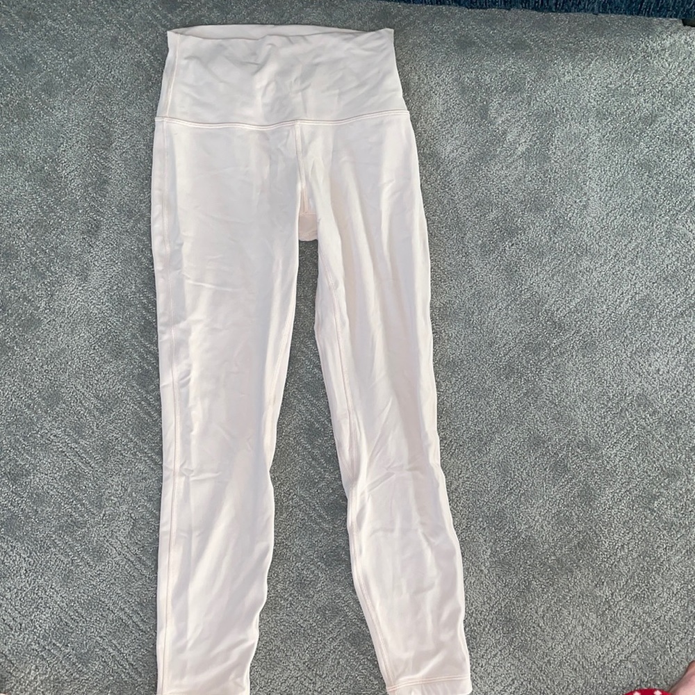 Lulu lemon cropped light pink leggings.